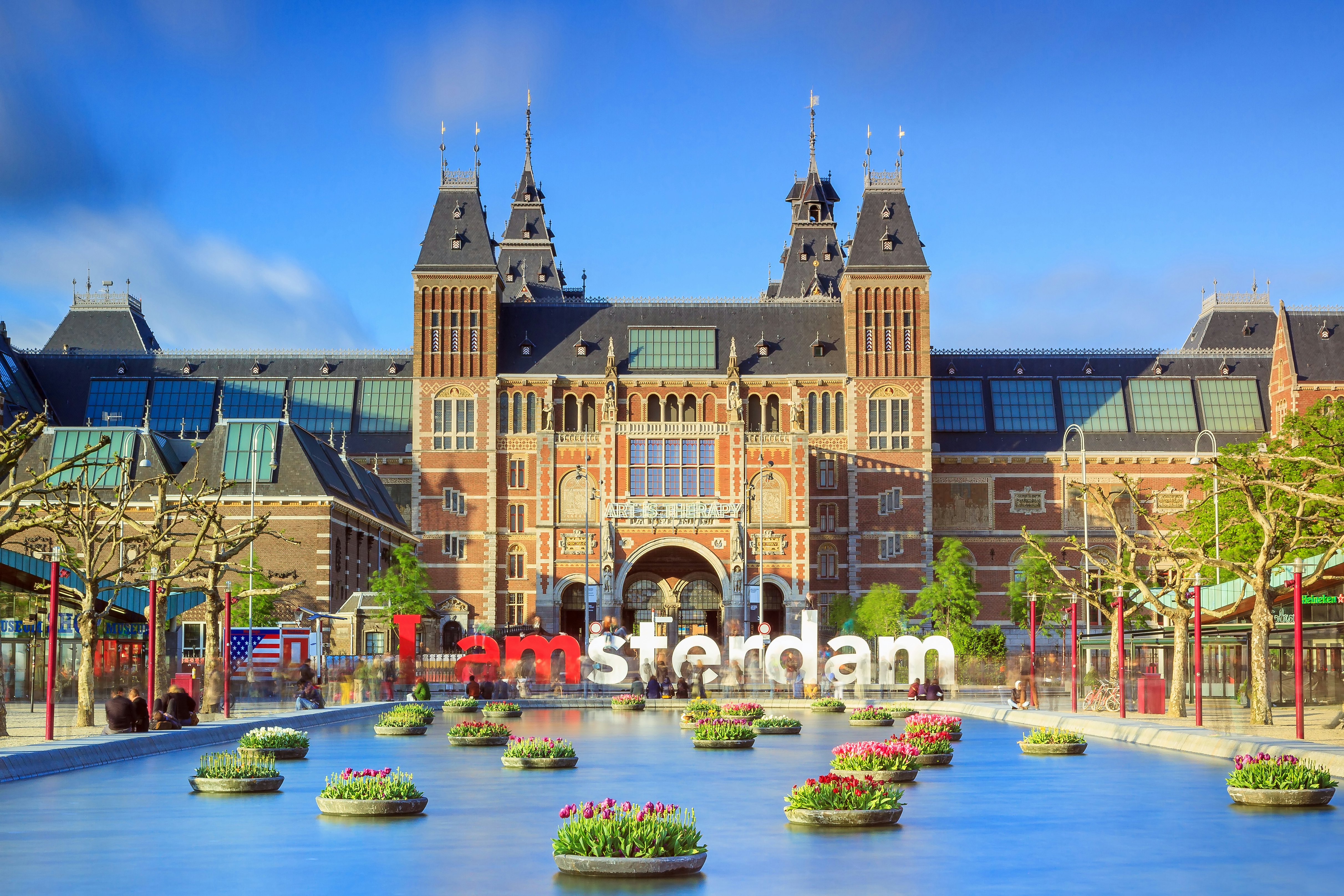 Rijksmuseum with tulips in Amsterdam..NOTE: dated image - "iamamsterdam" sign has been removed from outside museum.