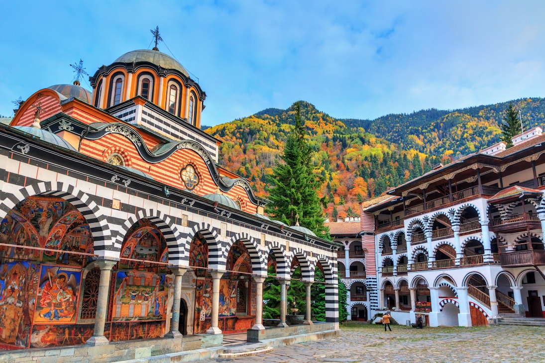 Exterior of the Orthodox Rila Monastery in the Rila Nature Park.
1160109394
ancient, architecture, attraction, autumn, beautiful, blue, building, bulgaria, church, city, clouds, courtyard, culture, destination, europe, exterior, facade, fall, famous, heritage, historic, history, journey, landmark, medieval, monastery, monument, mountains, national, national park, october, old, orthodox, park, religion, religious, rila, rila monastery, rila nature park, sky, structure, tourism, tourist, town, travel, unesco, vacation, vibrant, visit