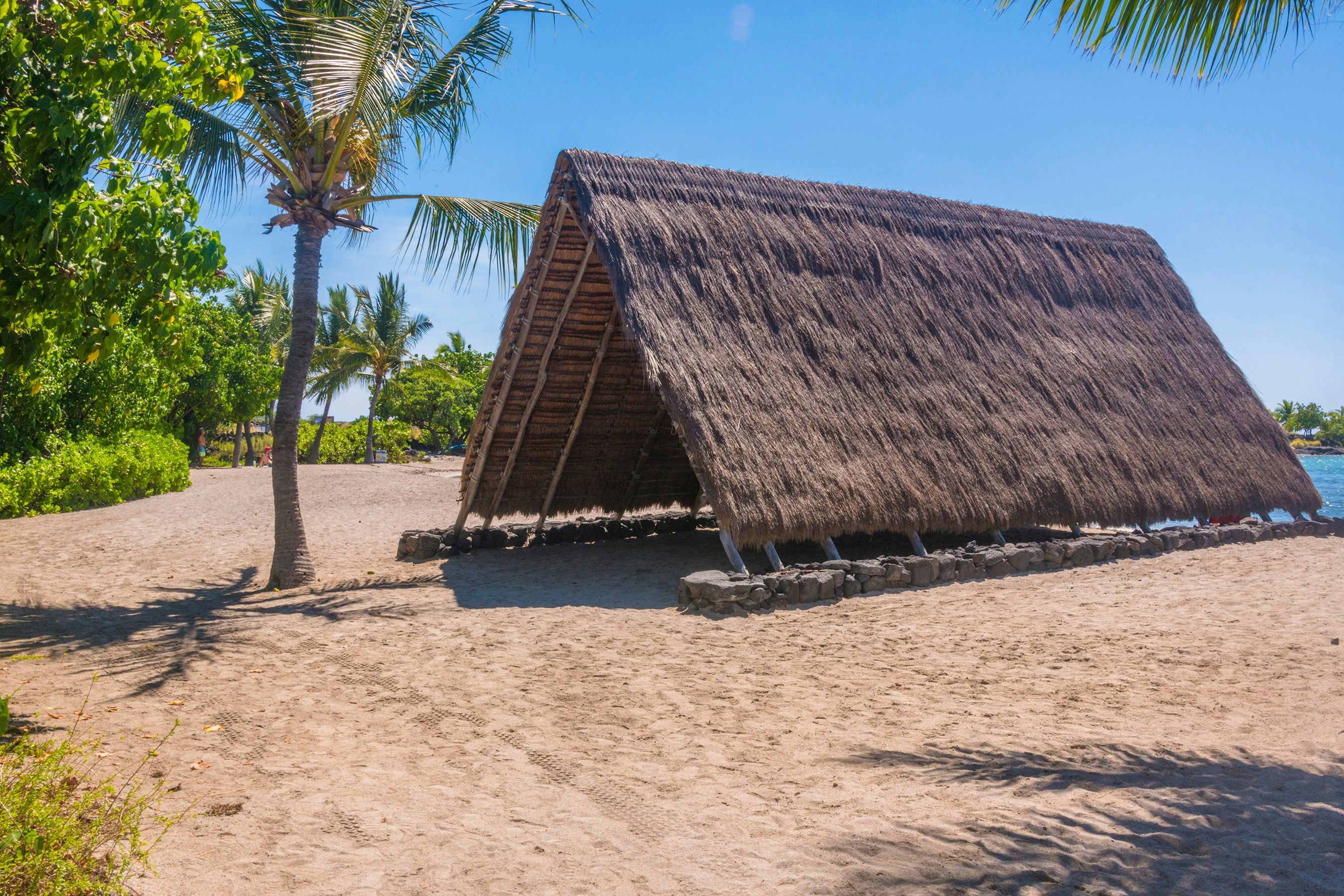 A thatched canoe house in Kaloko-Honokokau National Historical Park.
1196591794
beaches, big island, canoe house, clean, clear, halau wa'a, hawaii, hawaiian islands, honokohau beach, island of hawai'i, kaloko-honokokau national historical park, kona district, landscape, lush, outdoor, pacific ocean, pristine, scenic, sea, water, waterfall