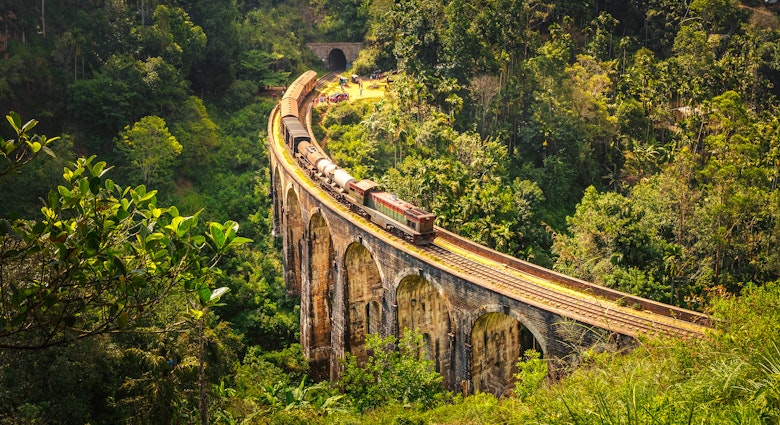 High-angle view of a train crossing the Nine Arches Bridge, just outside Ella.