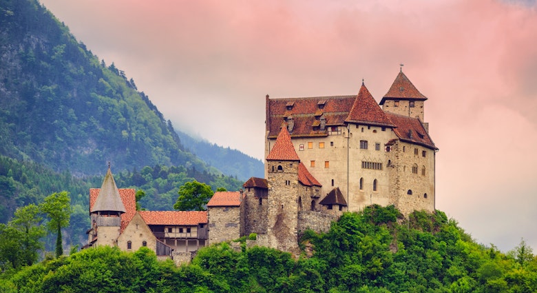 Gutenberg Castle, Principality of Liechtenstein.
156896486
outdoor, tree, tower, medieval, gutenberg, stone, green, travel, view, red, rock, sunrise, european, attraction, principality, castle, switzerland, grass, palace, old, alpine, top, alps, building, fortress, wall, architecture, city, mountain, rural, home, house, scenic, country, tourism, romantic, ancient, lichtenstein, scene, beautiful, background, nature, vacation, liechtenstein, europe, landscape, balzers