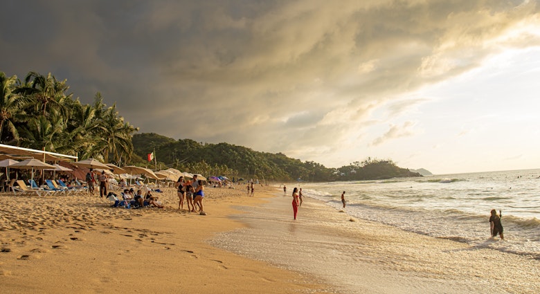 Sayulita Mexico October 15 2023 group of tourist loungeing on beach during sunset ; Shutterstock ID 2397606913; purchase_order: 65050 - Digital Destinations and Articles; job: Lonely Planet Online Editorial; client: First-time guide to Sayulita; other: Brian Healy
2397606913
active, adult, background, beach, beautiful, beauty, calm, clouds, cloudy, coastline, crashing, destination, footprints, island, jungle, mexico, nature, nayarit, ocean, pacific ocean, peaceful, people, resort, san pancho, silhouette, sun, sunrise, sunset, surf, tourism, tourist, travel, tropical, umbrellas, vacation, waves
Sayulita Mexico October 15 2023 group of tourist loungeing on beach during sunset