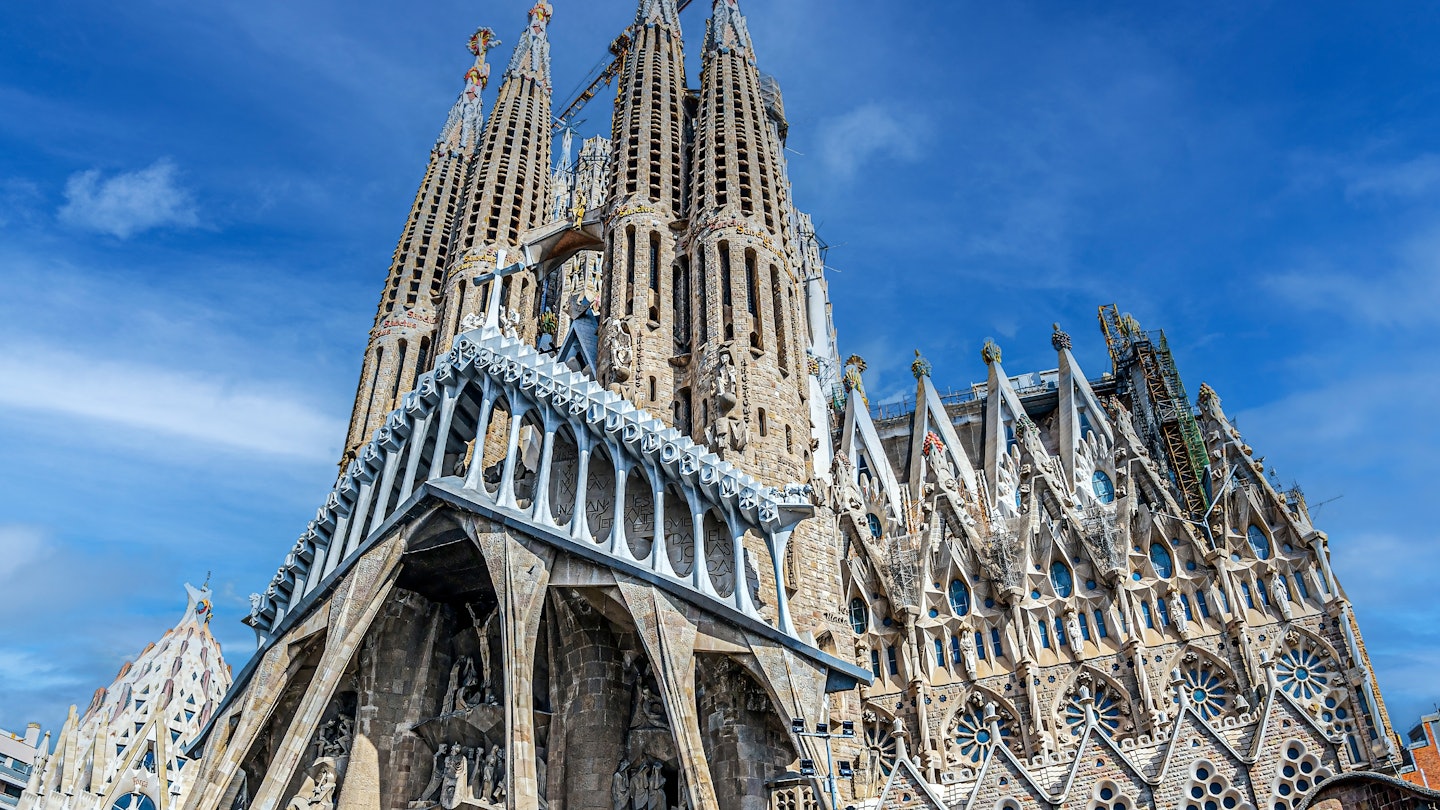 Barcelona, Catalonia, Spain-Feb. 27, 2022:Exterior of the famous cathedral La Sagrada Familia designed by architect Antoni Gaudi. It has been under construction since 1882. UNESCO World Heritage Site. License Type: media Download Time: 2023-02-02T04:11:56.000Z User: claramonitto Is Editorial: Yes purchase_order: